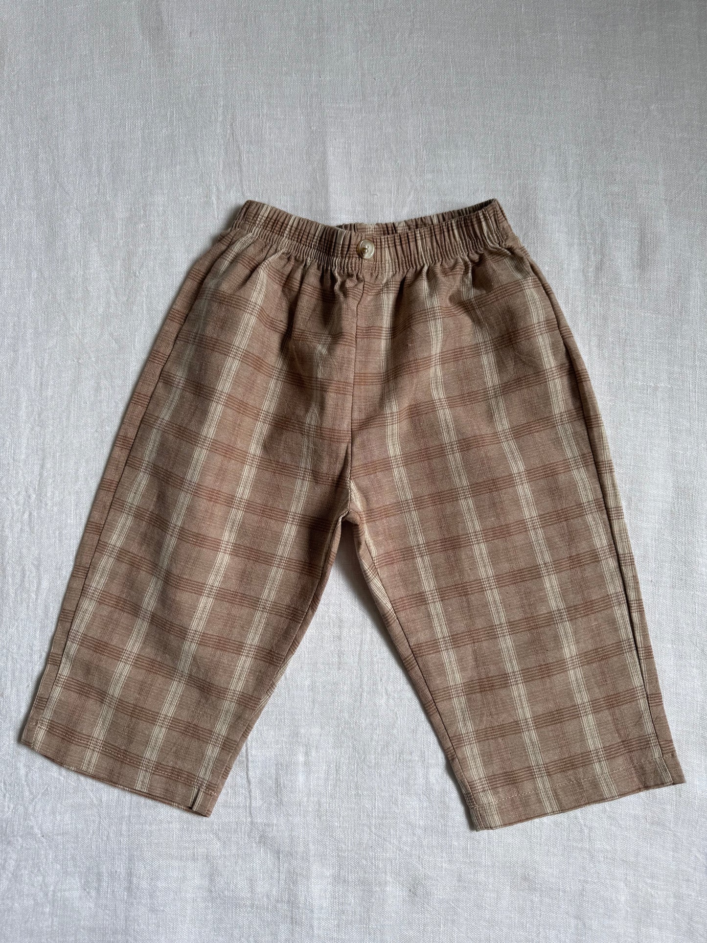 Beige plaid pants for toddlers, 100% cotton.